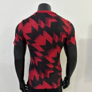 Players 2025-26 Manchester United training jersey in red and black